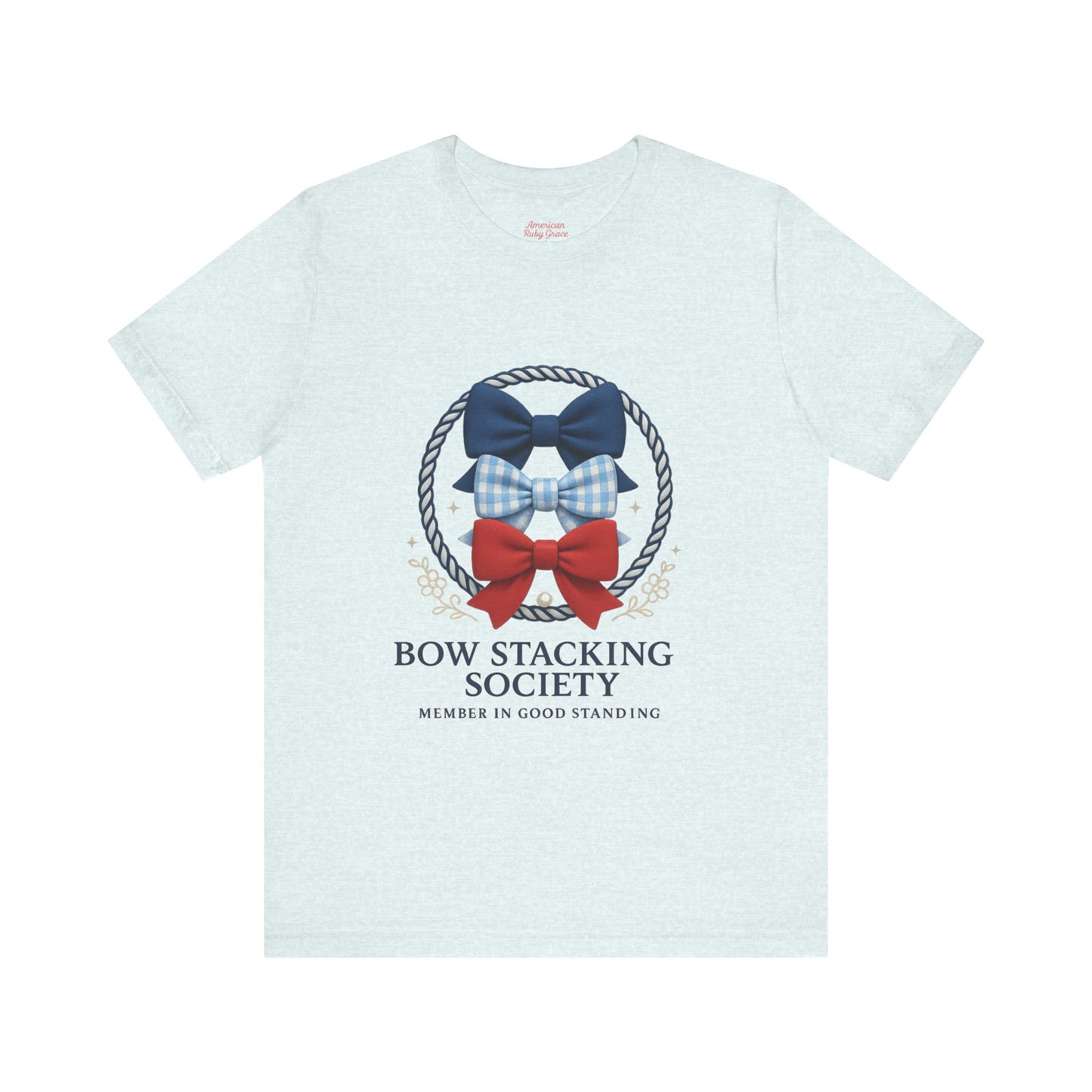 Light blue T-shirt featuring Bow Stacking Society logo with stacked bows in red and blue and rope motif.